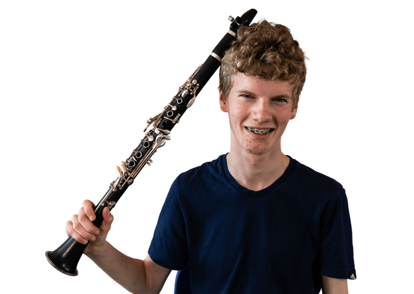 Clarinet player holding instrument to the side
