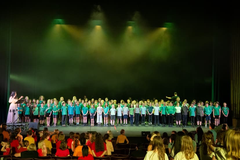 Massed Primary School Choir on stage at A Place of Wonder